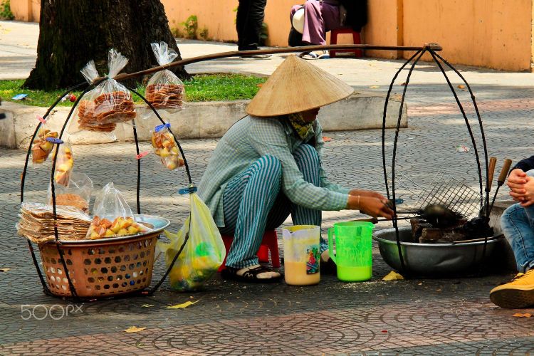 Local food seller in Hanoi, Vietnam